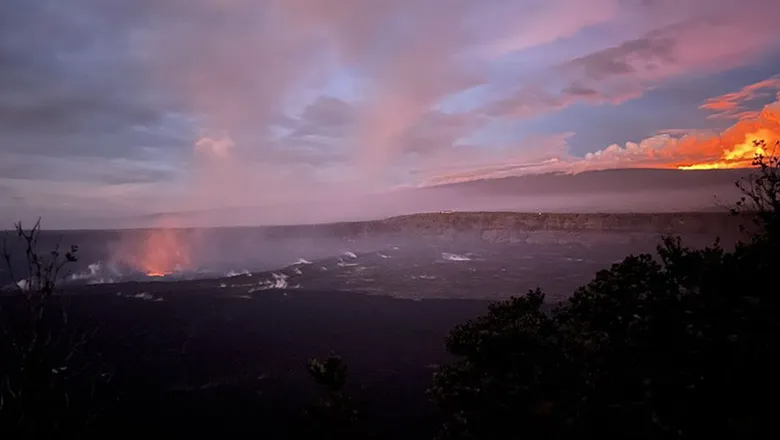 A view of the Kilauea eruption on the left and Mauna Loa eruption on the right can be seen at the Hawaii Volcanoes National Park. Photo Credit: Courtesy of National Park Service/B. Hayes