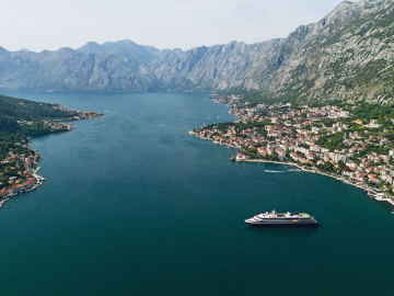 Atlas Ocean Voyages’ World Traveller in Montenegro. Prices for Europe cruises are up this summer. Photo Credit: Atlas Ocean Voyages