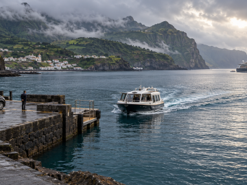 Alt tag: Tender boat approaches a volcanic island port while a luxury cruise ship waits offshore, illustrating the logistics that shape a cruise port day.
